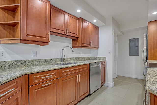 kitchen featuring dishwasher, sink, light tile patterned floors, electric panel, and light stone countertops