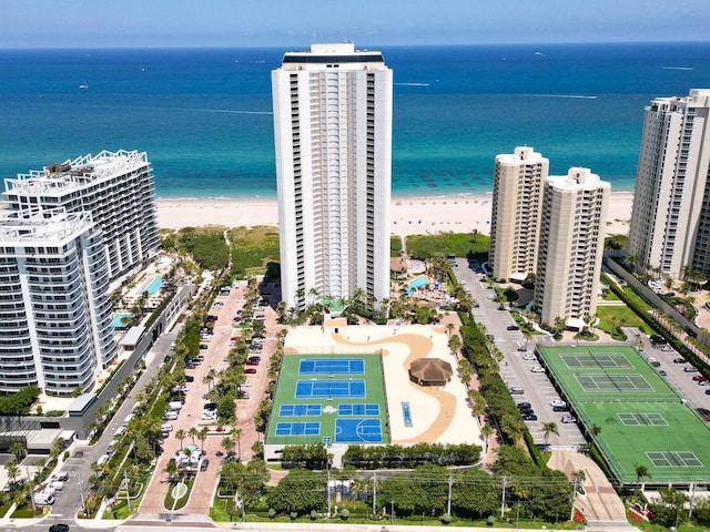 birds eye view of property featuring a water view and a view of the beach