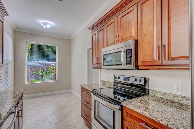 kitchen featuring light tile patterned flooring, ornamental molding, light stone countertops, and appliances with stainless steel finishes