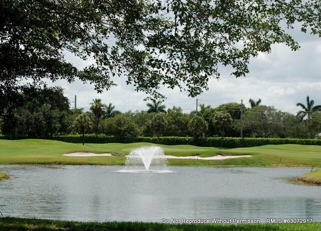 1215 Gator Trl, West Palm Beach, FL 33409 - view of community with golf course view and a yard