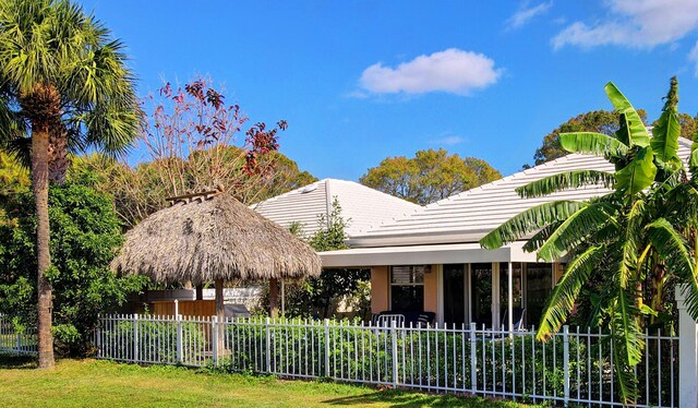 view of home's community with a lawn