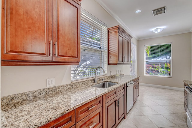 1215 Gator Trl, West Palm Beach, FL 33409 - kitchen featuring a sink, ornamental molding, appliances with stainless steel finishes, light stone counters, and healthy amount of natural light
