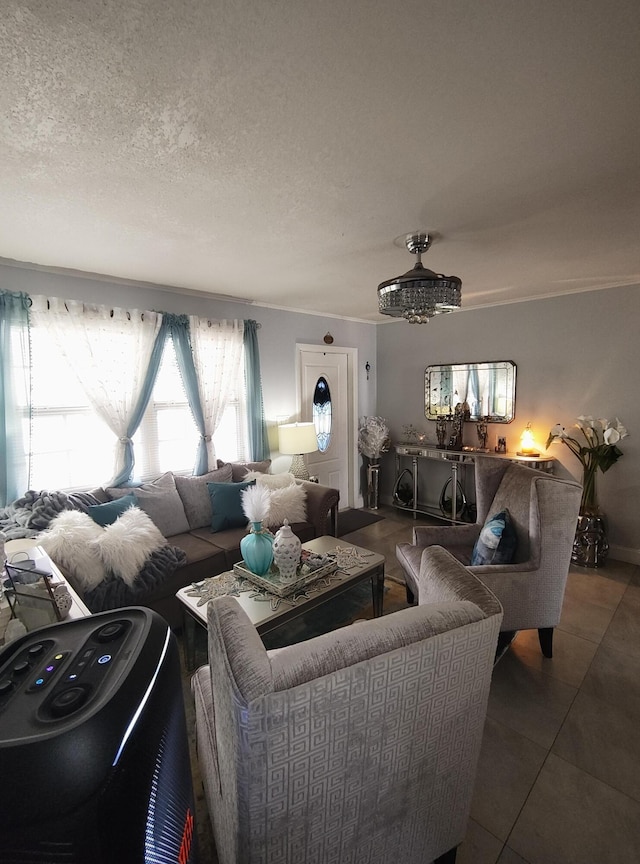 living room with tile patterned floors and a textured ceiling