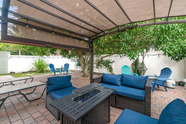 view of patio / terrace featuring an outdoor living space with a fire pit and a pergola