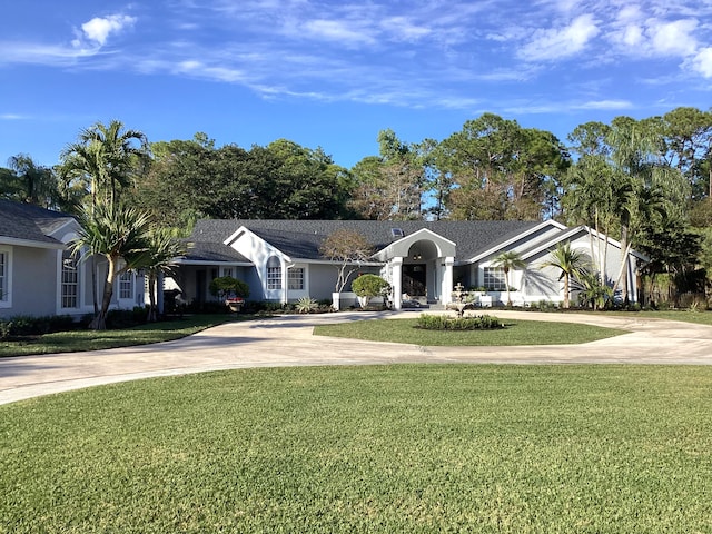 ranch-style house with a front yard