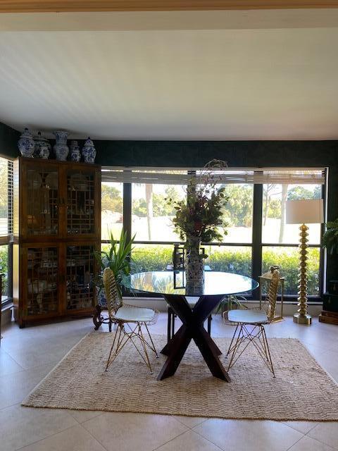 unfurnished dining area with plenty of natural light