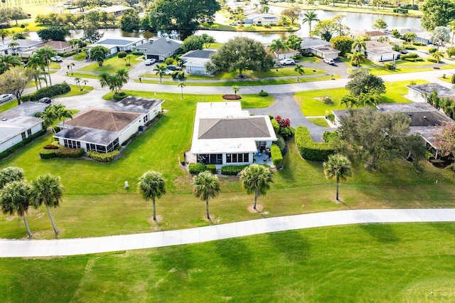 aerial view featuring a water view and a residential view