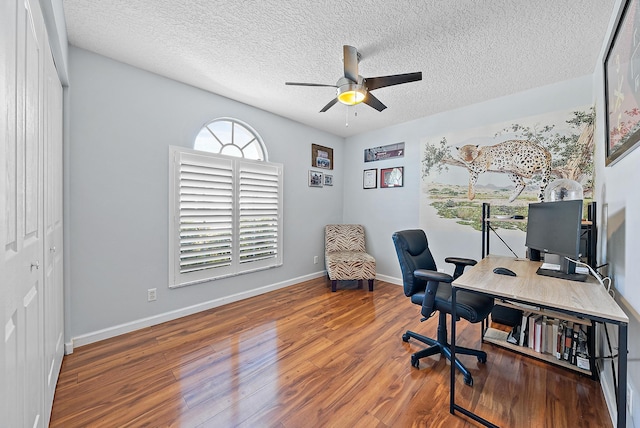 office area with hardwood / wood-style floors, a textured ceiling, and ceiling fan