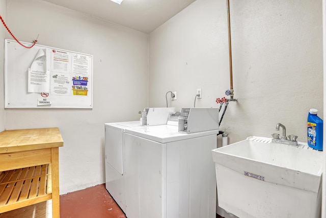 laundry room featuring sink and washing machine and dryer