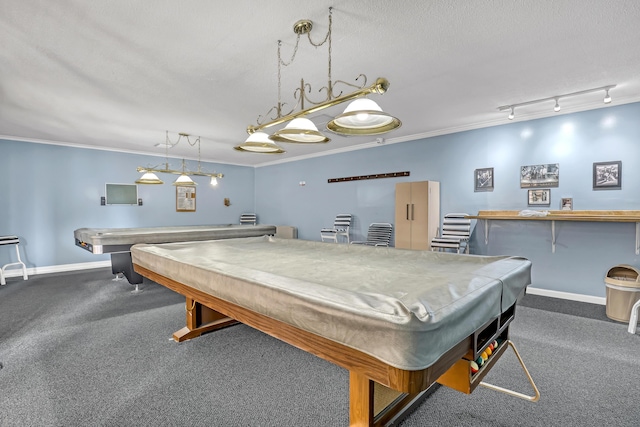 playroom with pool table, ornamental molding, rail lighting, and a textured ceiling