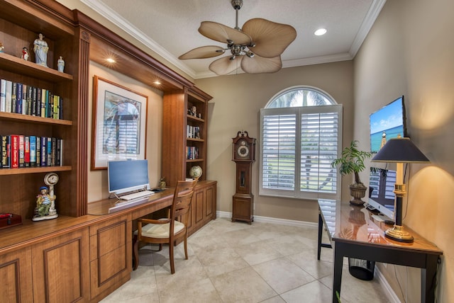 office with baseboards, a ceiling fan, crown molding, and built in study area