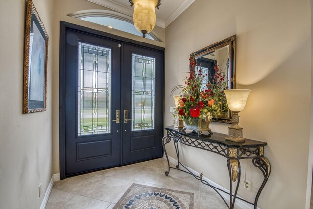 office area with light tile patterned floors, crown molding, built in desk, and ceiling fan