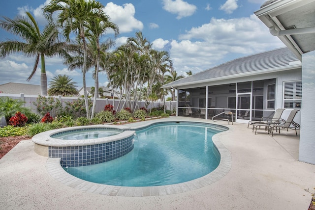 view of pool with a patio area, a pool with connected hot tub, a fenced backyard, and a sunroom