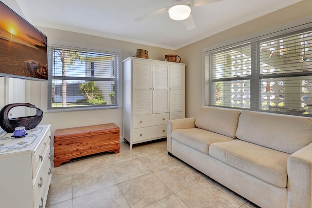 interior space featuring ornamental molding and ceiling fan