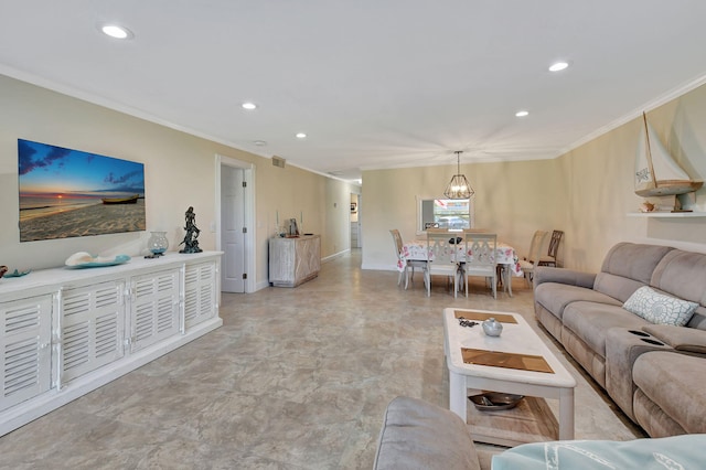 living room featuring ornamental molding and a chandelier