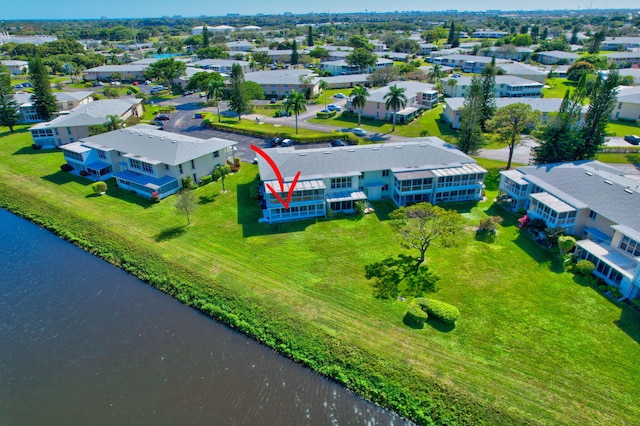 drone / aerial view featuring a water view