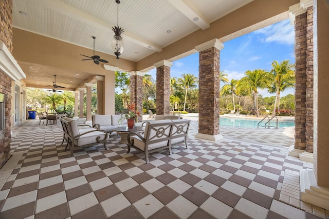 view of patio featuring ceiling fan and outdoor lounge area