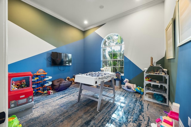 rec room featuring crown molding and wood-type flooring