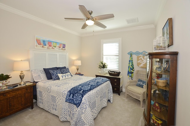 bedroom featuring light carpet, ornamental molding, and ceiling fan