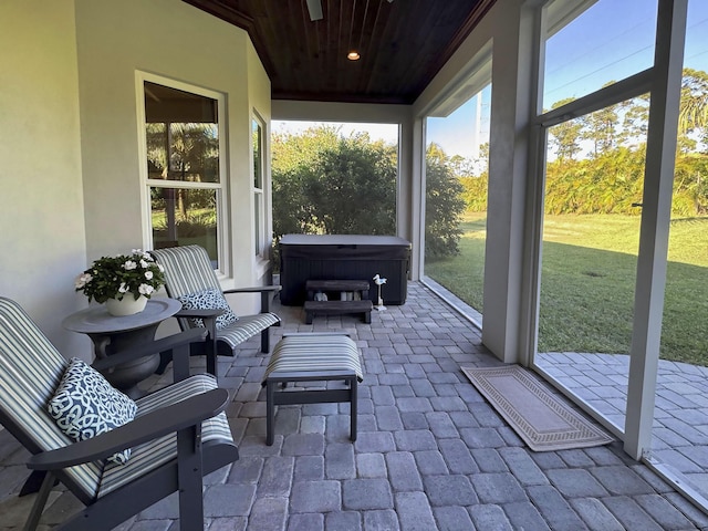 sunroom / solarium with wood ceiling