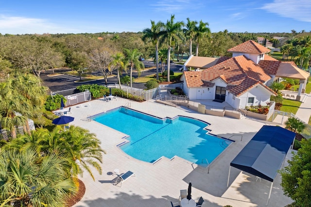 view of swimming pool featuring a patio area