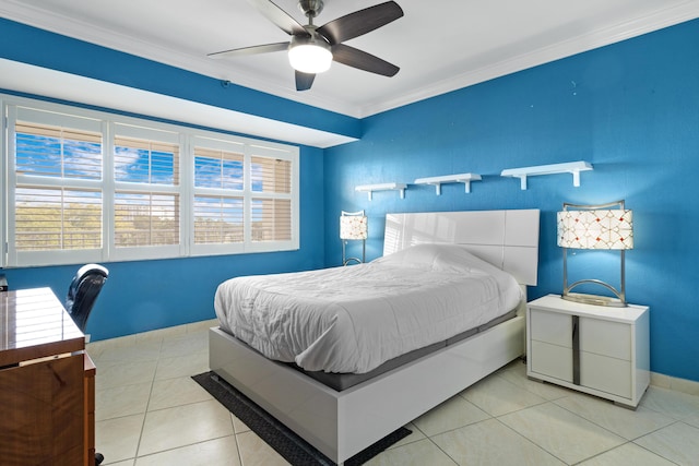 tiled bedroom with ornamental molding and ceiling fan