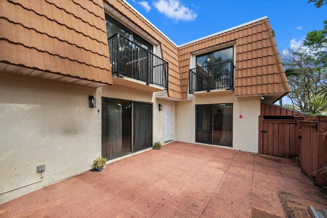 rear view of property with a patio area