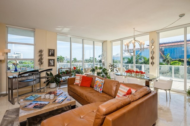 sunroom featuring an inviting chandelier