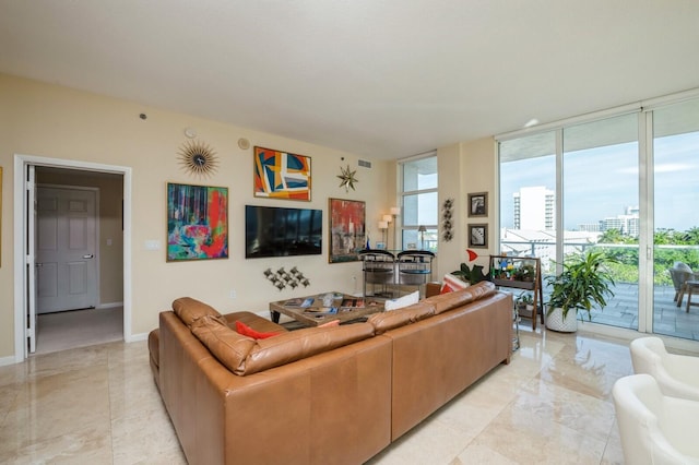 living room with a wall of windows