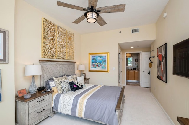 bedroom featuring light colored carpet and ceiling fan