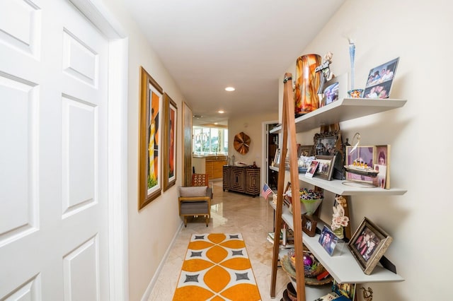 hallway featuring light tile patterned floors