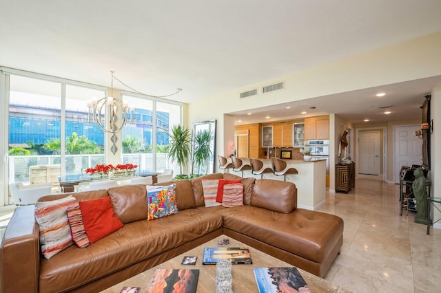 living room featuring a chandelier