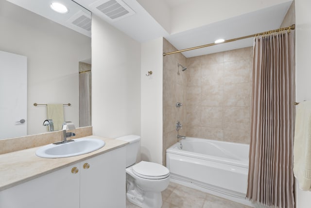 full bathroom with tile patterned flooring, vanity, shower / tub combo, and toilet