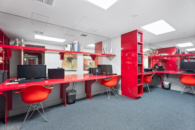 office space with carpet floors and built in desk