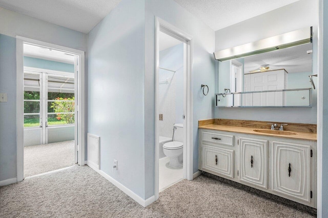 180 High Point Ter E Unit C, Delray Beach, FL 33445 - bathroom featuring vanity, a ceiling fan, baseboards, toilet, and shower / bath combination