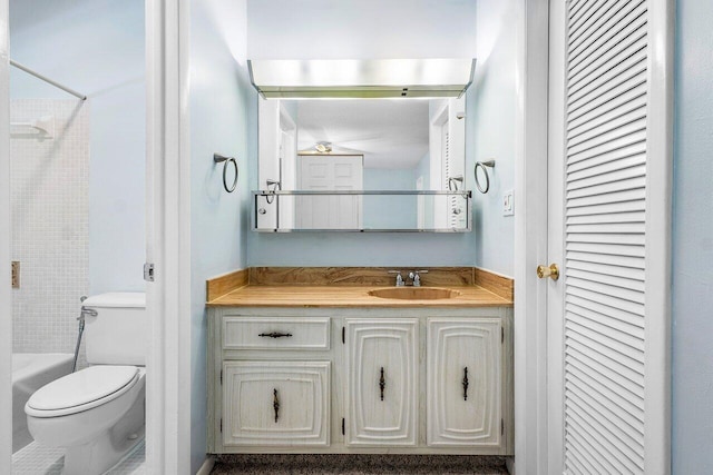 180 High Point Ter E Unit C, Delray Beach, FL 33445 - bathroom with vanity, toilet, a closet, and washtub / shower combination