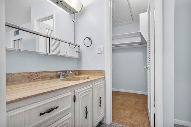 180 High Point Ter E Unit C, Delray Beach, FL 33445 - bathroom with baseboards and vanity