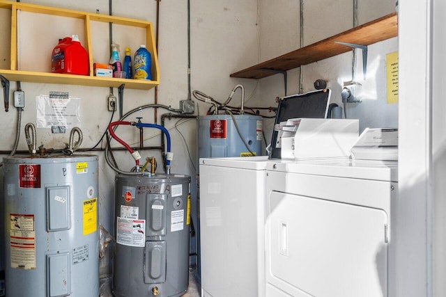 180 High Point Ter E Unit C, Delray Beach, FL 33445 - washroom with electric water heater and washer and clothes dryer