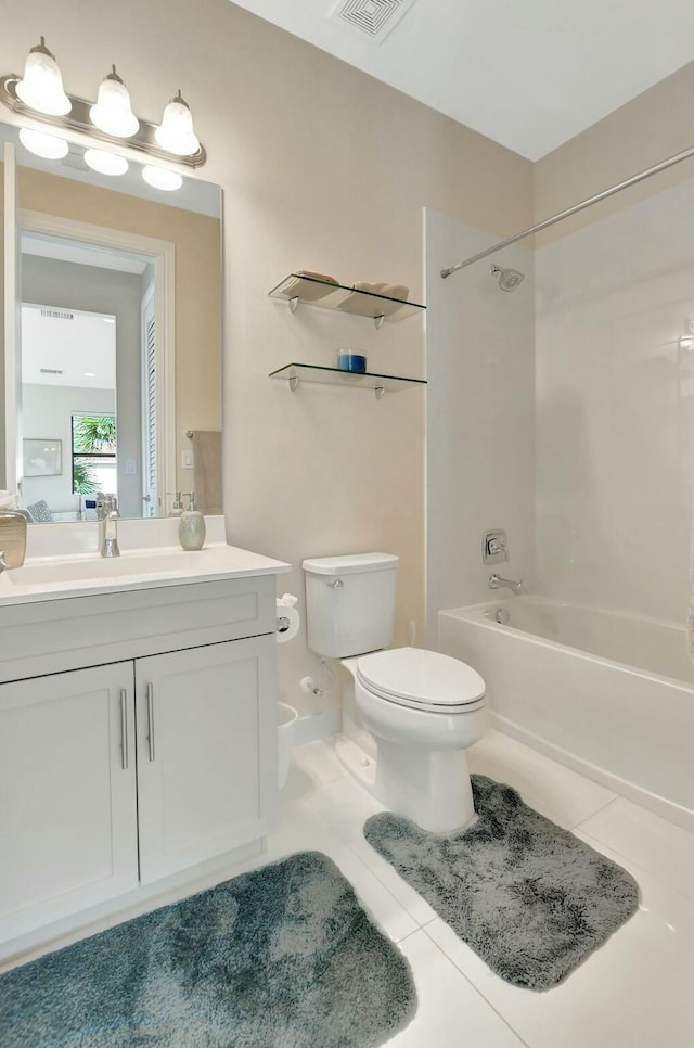 full bathroom with shower / washtub combination, toilet, tile patterned flooring, and vanity