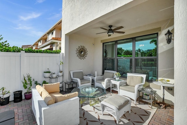 view of patio / terrace featuring an outdoor hangout area and ceiling fan