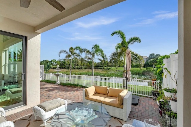 view of patio / terrace featuring ceiling fan