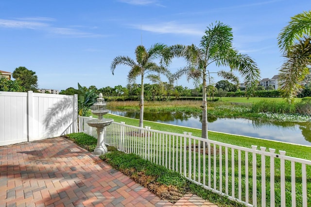 view of patio / terrace with a water view