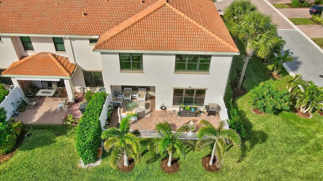 back of house featuring a patio area