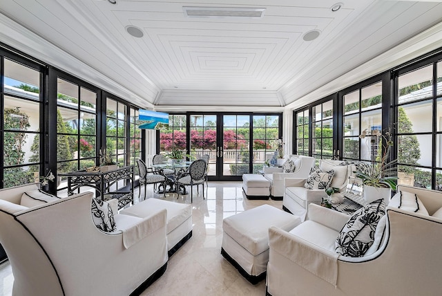 sunroom / solarium with wood ceiling and french doors