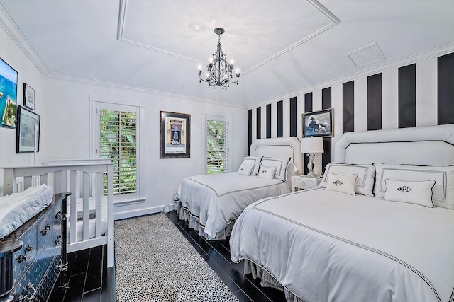 bedroom featuring an inviting chandelier and crown molding