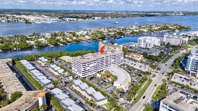 birds eye view of property featuring a water view