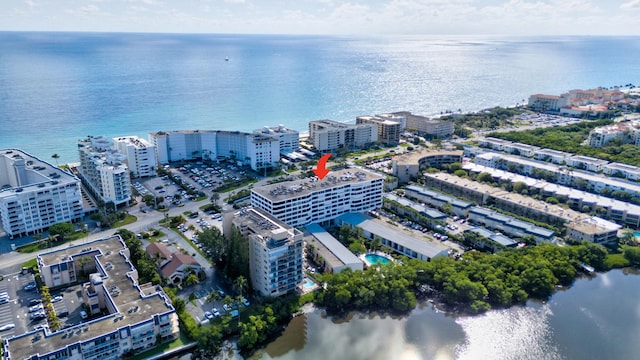 bird's eye view with a water view