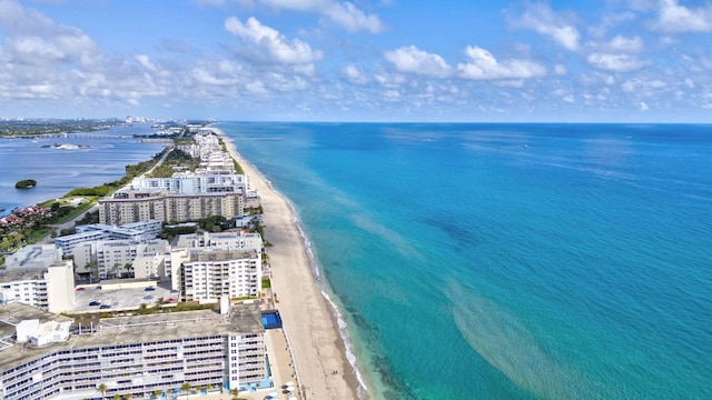 aerial view featuring a water view and a view of the beach