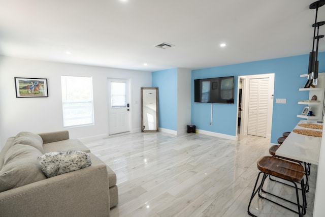 living room featuring light wood-type flooring