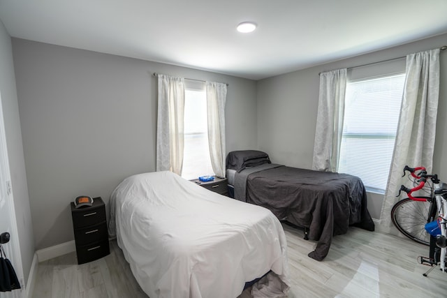 bedroom featuring light wood-type flooring